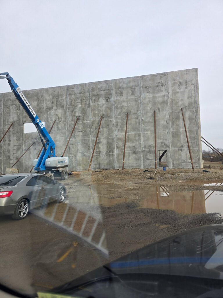 Concrete wall construction with access equipment"